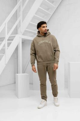 Cou7ure Essentials Basic Curve Trainingspak Heren Groen - Maat M - Kleur: Groen | Soccerfanshop