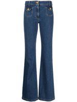 Moschino jean à boutons à logo - Bleu