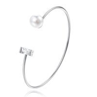 Zilverkleurige armband met Rechthoekige Zirkonia Steen en Imitatie Parel