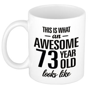 Awesome 73 year cadeau mok / beker 300 ml