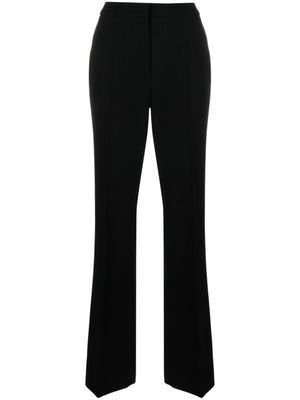 Moschino pantalon à coupe évasée - Noir