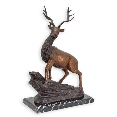 A BRONZE SCULPTURE OF A DEER ON A MARBLE BASE