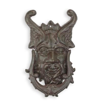 A CAST IRON DEVIL FACE DOOR KNOCKER
