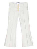 Balmain Kids pantalon évasé à logo brodé - Blanc