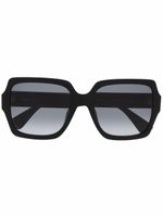 Moschino Eyewear lunettes de soleil teintées à monture oversize - Noir