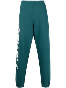 Heron Preston pantalon de jogging à imprimé - Bleu