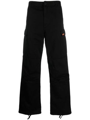 Heron Preston pantalon ample à patch logo - Noir Heron Preston pantalon ample à patch logo - Noir