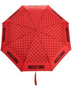 Moschino parapluie à imprimé monogrammé - Rouge