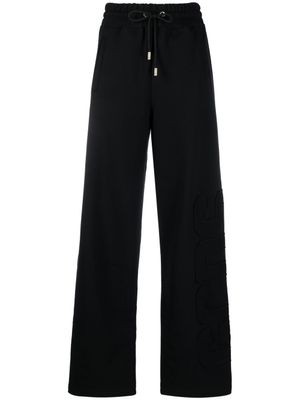 GCDS pantalon de jogging à logo appliqué - Noir