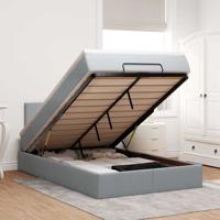 Ottoman bed met matras en LED's 120x200 cm stof lichtgrijs