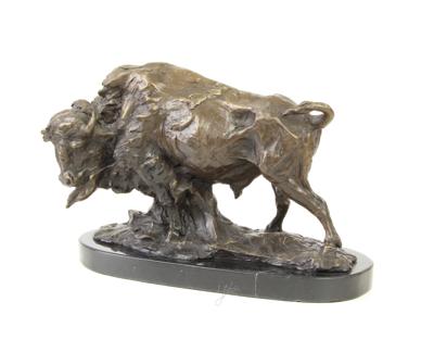 A BRONZE SCULPTURE OF A BUFFALO