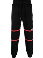 GCDS pantalon de jogging en coton à rayures - Noir