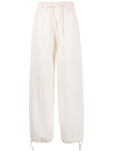 Acne Studios pantalon de jogging à lien de resserrage - Blanc