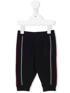 Moncler Enfant pantalon de jogging à rayures latérales - Bleu