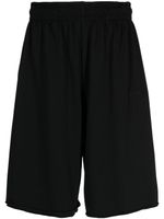 VETEMENTS short en jersey à logo brodé - Noir