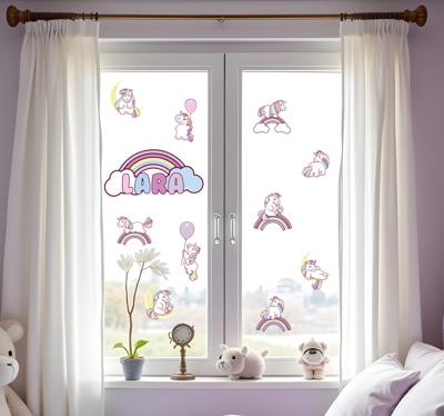 Eenhoorns en regenbogen raamsticker