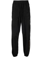 Versace pantalon de jogging à imprimé La Greca - Noir