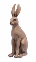 A RESIN FIGURINE OF A SITTING HARE