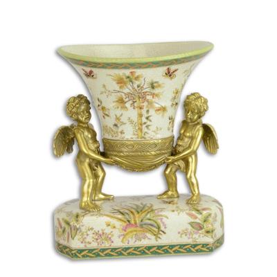 A BRONZE MOUNTED PORCELAIN CENTERPIECE