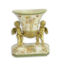 A BRONZE MOUNTED PORCELAIN CENTERPIECE