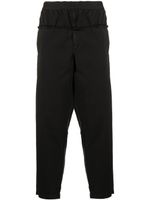 Comme Des Garçons Shirt x Christian Marclay pantalon à design tissé - Noir Comme Des Garçons Shirt x Christian Marclay pantalon à design tissé - Noir