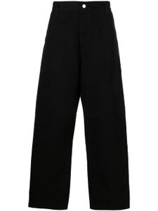 Carhartt WIP pantalon ample à patch logo - Noir