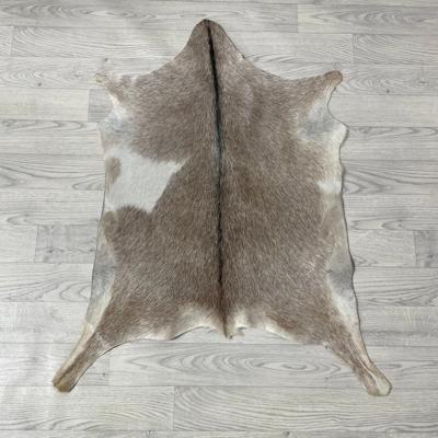 Geitenhuid bruin zwart wit 95x70cm