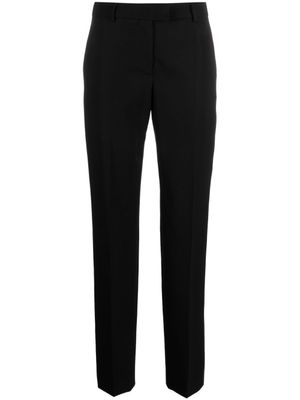 Moschino pantalon de tailleur en laine vierge - Noir