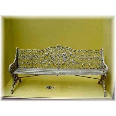 A CAST IRON GARDEN BENCH