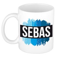 Naam cadeau mok / beker Sebas met blauwe verfstrepen 300 ml