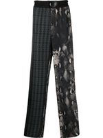 Roberto Cavalli pantalon de jogging en soie à imprimés multiples - Noir
