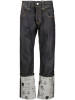 Junya Watanabe MAN jean droit à imprimé graphique - Bleu