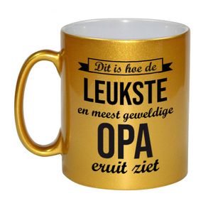 Leukste en meest geweldige opa cadeau mok / beker goudglanzend 330 ml - feest mokken