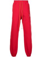 RHUDE pantalon de jogging fuselé à logo brodé - Rouge