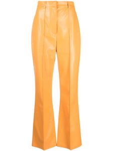 Nanushka pantalon Leena en cuir artificiel - Orange