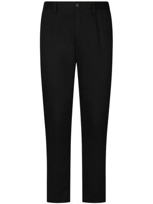 Dolce & Gabbana pantalon de tailleur à logo embossé - Noir