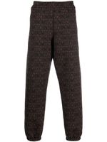 Moschino pantalon de jogging à logo brodé - Marron