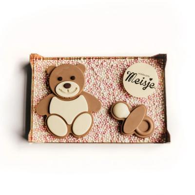 Chocolade babybeer met speen op plak