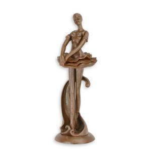 A CAST IRON SCULPTURE OF A BALLERINA - RUSTY FINISH