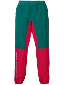 JohnUNDERCOVER pantalon de jogging bicolore - Vert