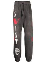 SAINT MXXXXXX x Valone pantalon de jogging à logo imprimé - Gris