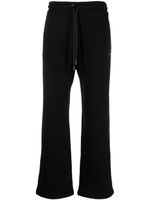 Off-White pantalon de jogging à imprimé Arrows - Noir