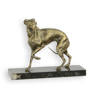 A CAST IRON DOG ON MARBLE BASE