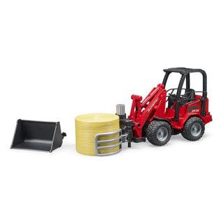 Bruder shovel schaeffer 2630 balengrijper met ronde hooibaal