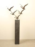 5 bronzen zwanen