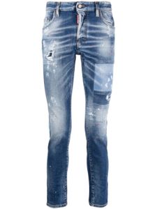 DSQUARED2 paint-splatter distressed skinny jeans - Bleu