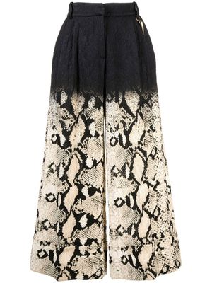 Roberto Cavalli pantalon ample à imprimé peau de python - Noir