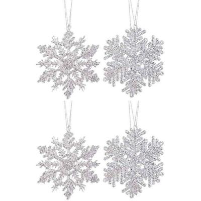 4x Kersthangers figuurtjes zilveren sneeuwvlok/ster 12 cm glitte