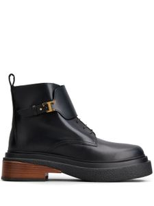 Tod's bottines en cuir à plaque logo - Noir