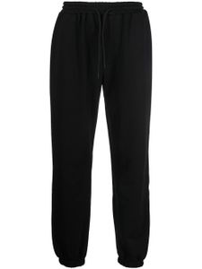 MSGM pantalon de jogging en coton à logo imprimé - Noir